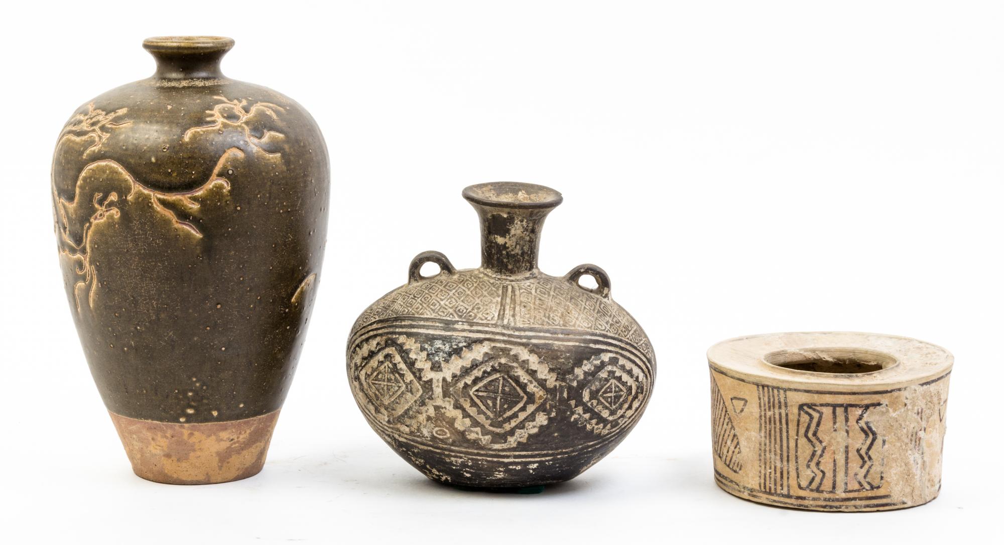 A Group of Four Pottery Vessels Height of tallest 10 3/4 inches.