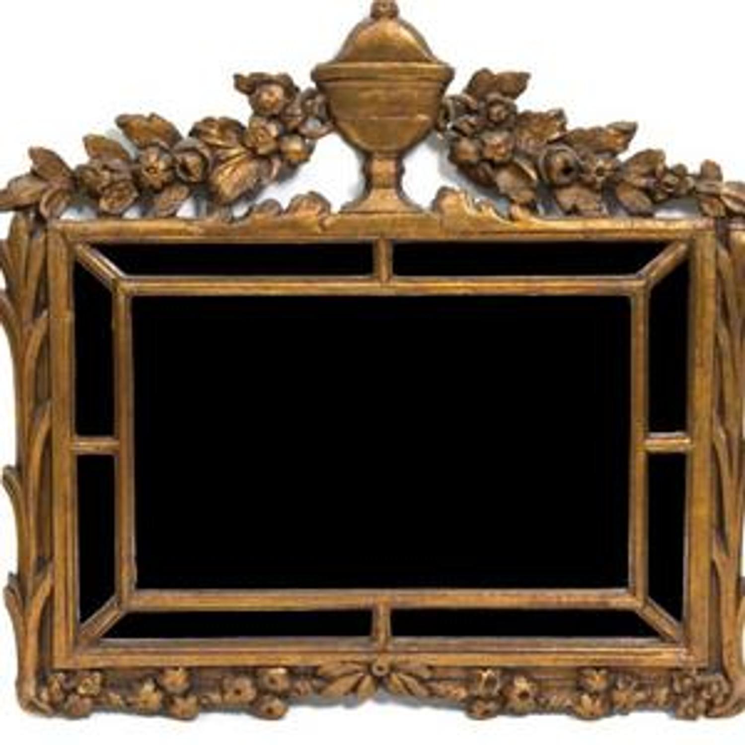 A Continental Giltwood Mirror — 19TH CENTURY