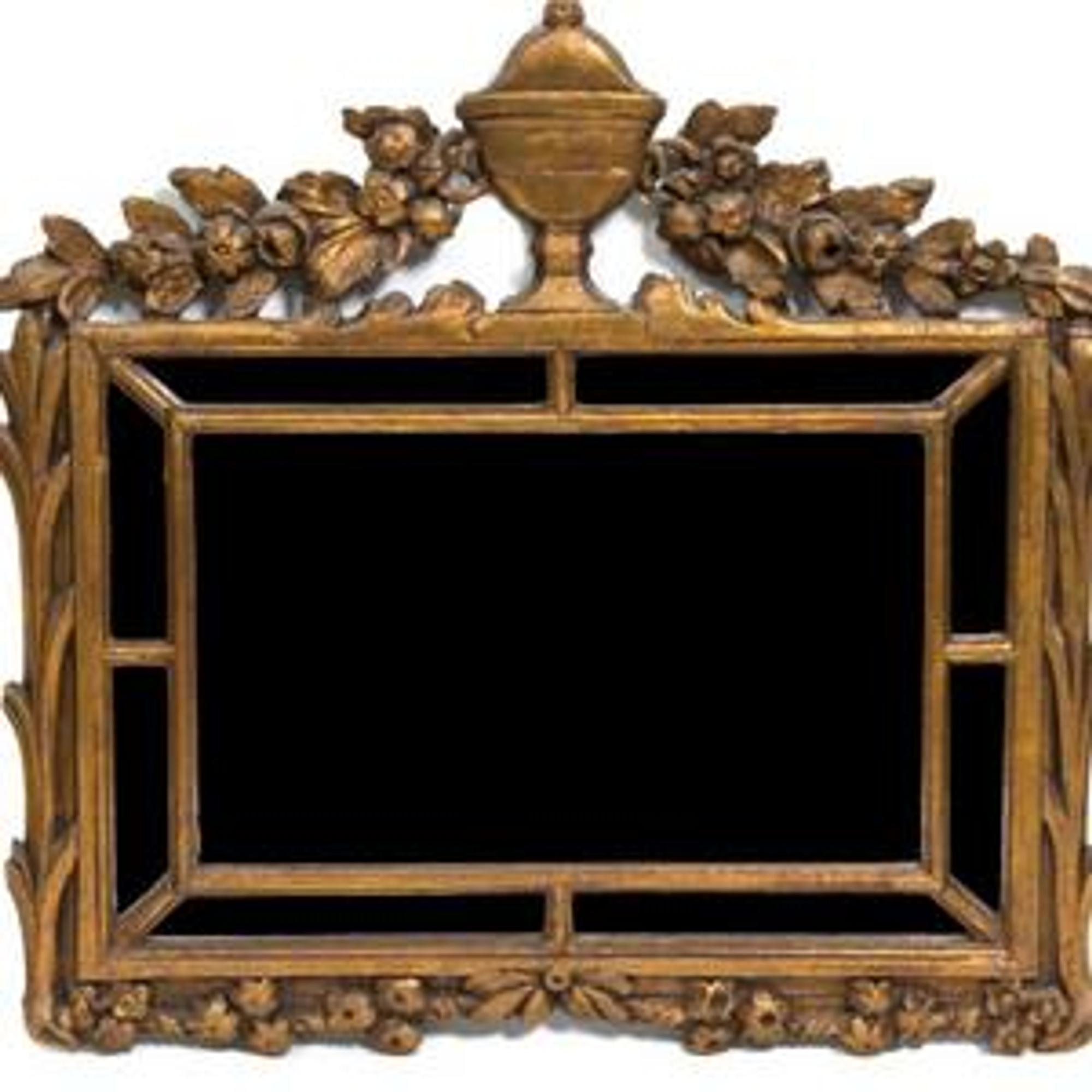A Continental Giltwood Mirror — 19TH CENTURY