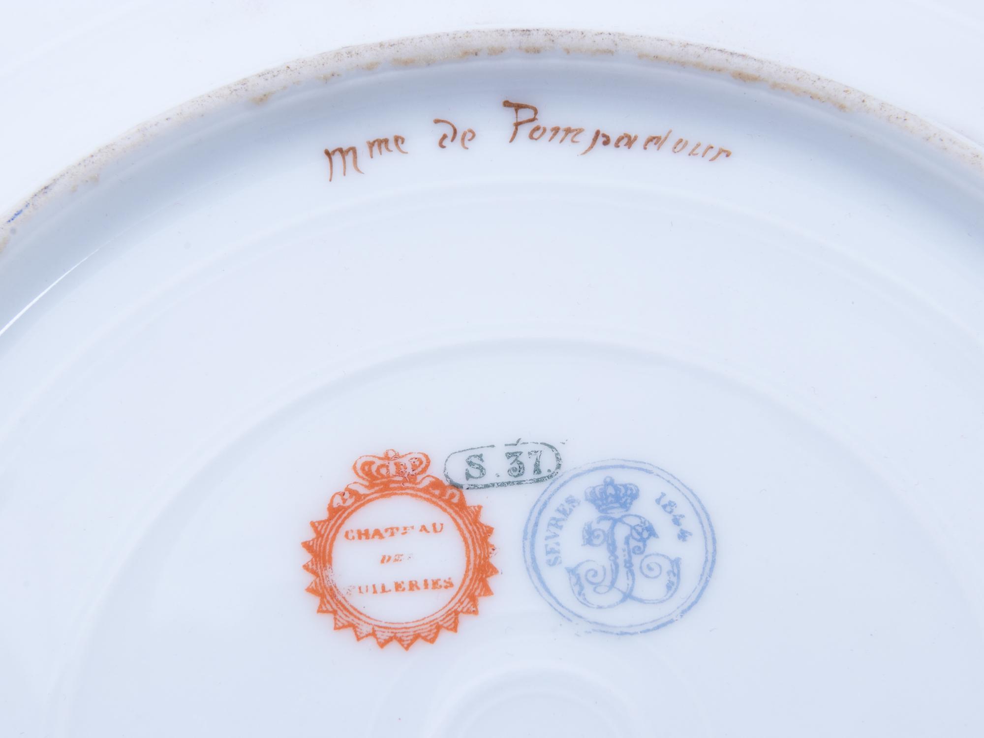 A Pair of Sèvres Painted and Parcel Gilt Pink-Ground Porcelain Plates