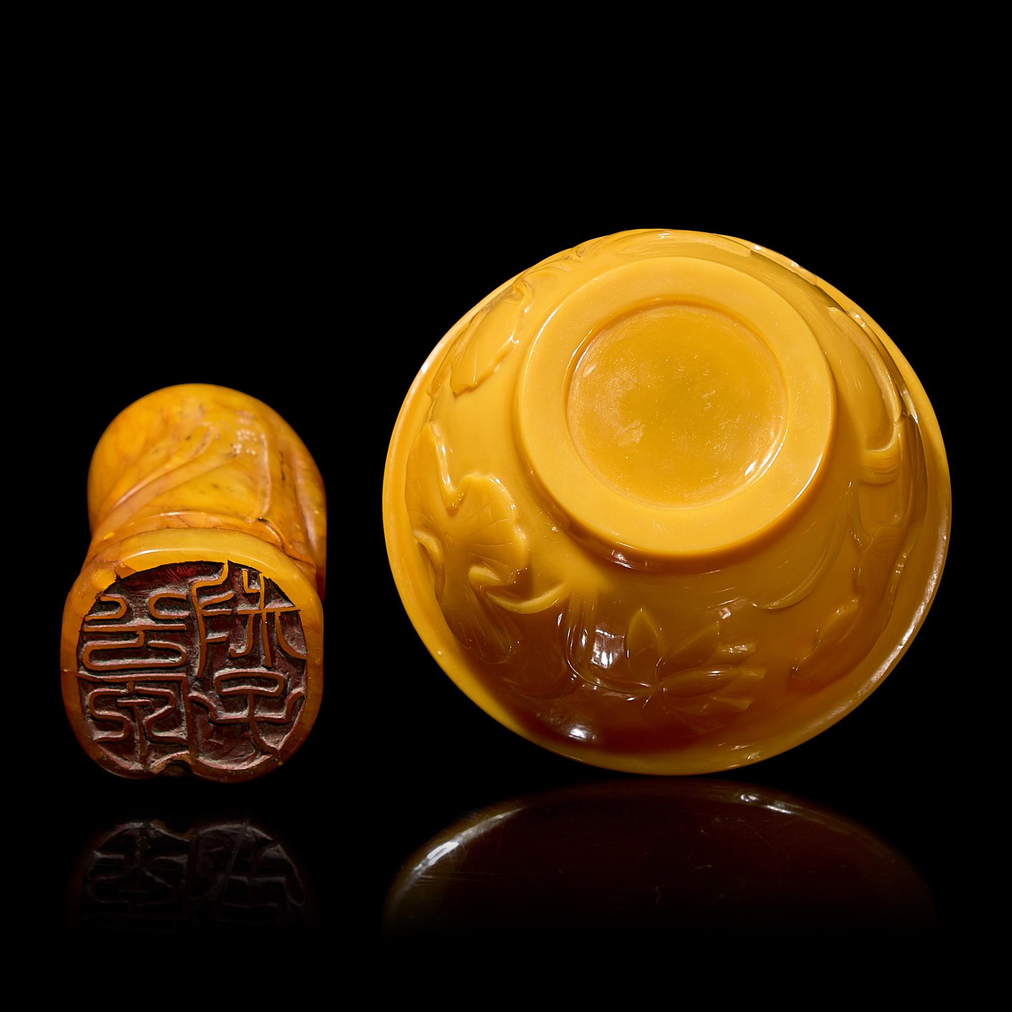 A Chinese Carved Stone "Luohan" Seal and a Yellow "Peking" Glass Bowl 壽山石雕羅漢和黃料花卉紋盌各一