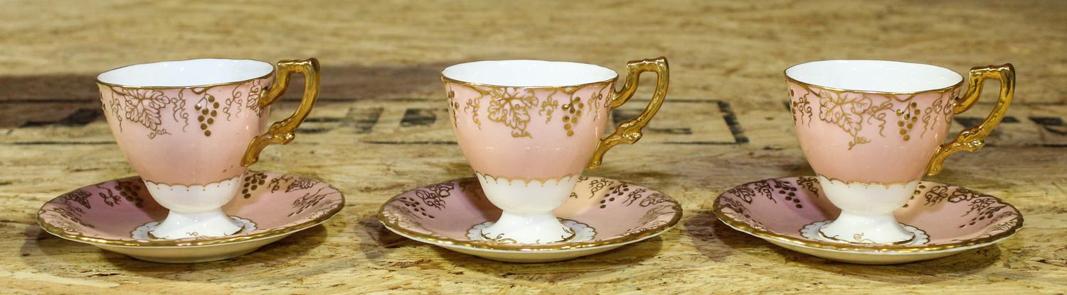 A Set of Twelve Royal Crown Derby Teacups and Saucers Height 3 inches.
