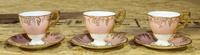 A Set of Twelve Royal Crown Derby Teacups and Saucers Height 3 inches.