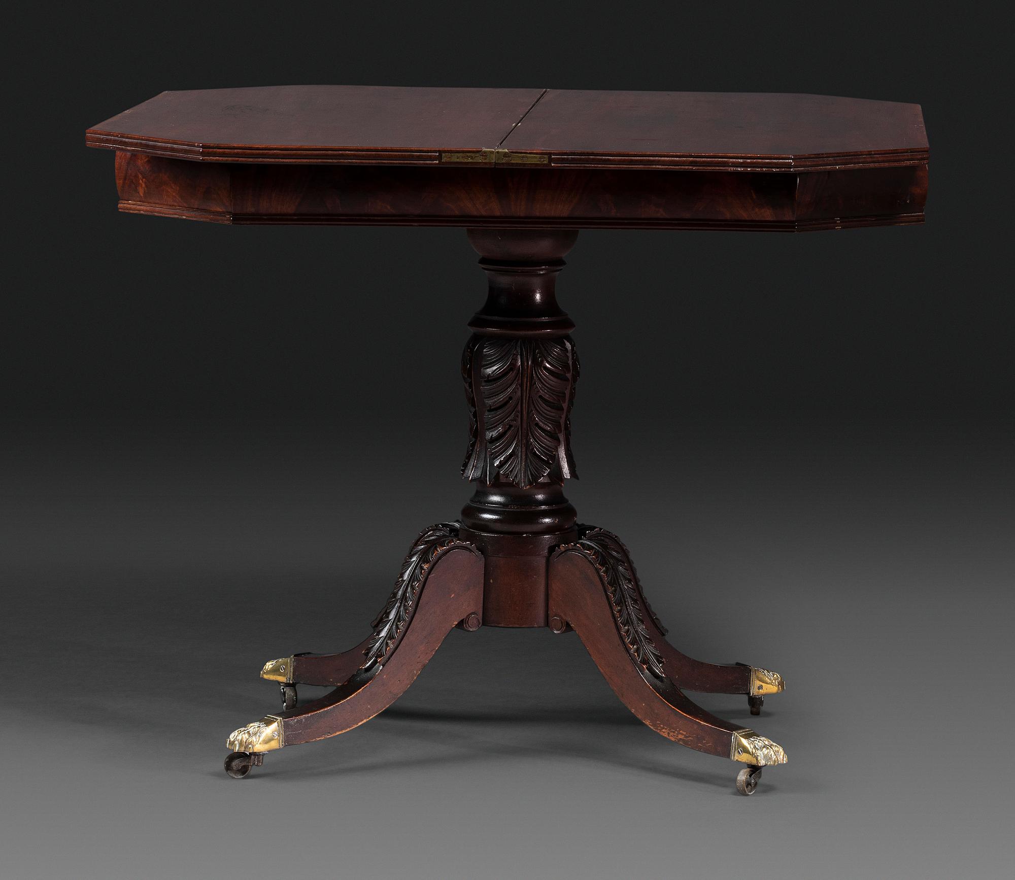 A Classical Carved and Brass Mounted Mahogany Claw-Foot Card Table