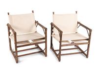 A Pair of Rattan and Leather Chairs