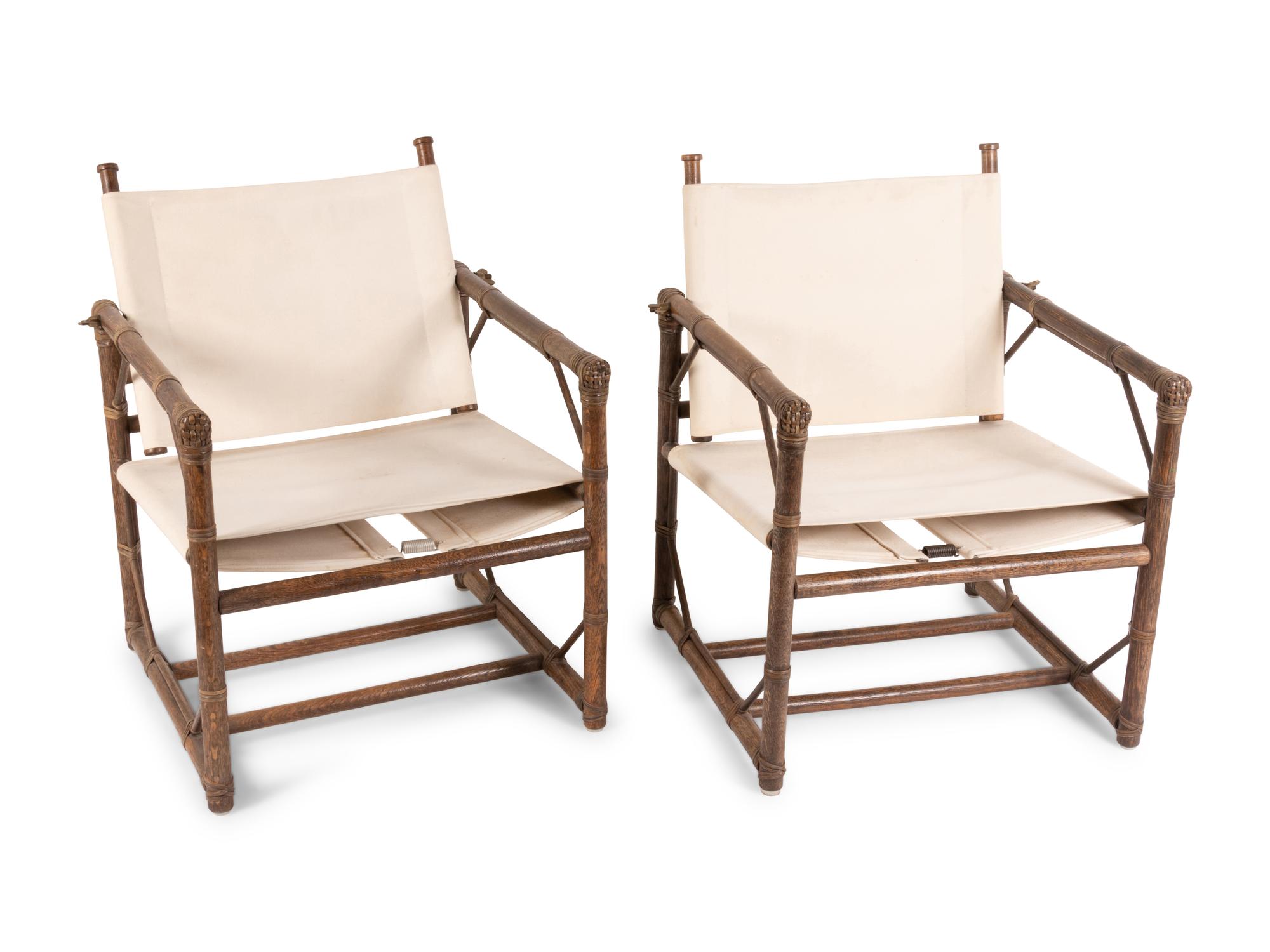 A Pair of Rattan and Leather Chairs
