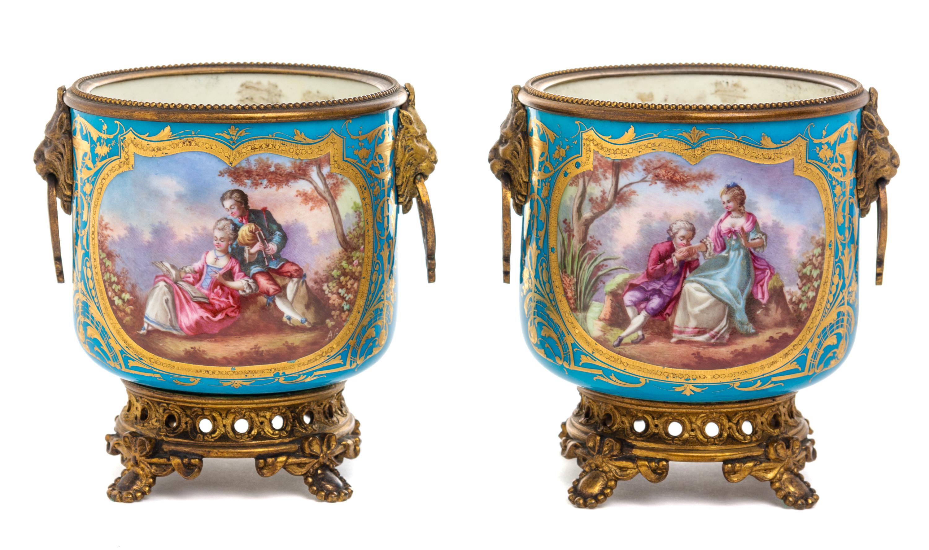 A Pair of Sevres Style Gilt Metal Mounted Porcelain Cache Pots Height 5 1/2 inches. — 19TH CENTURY
