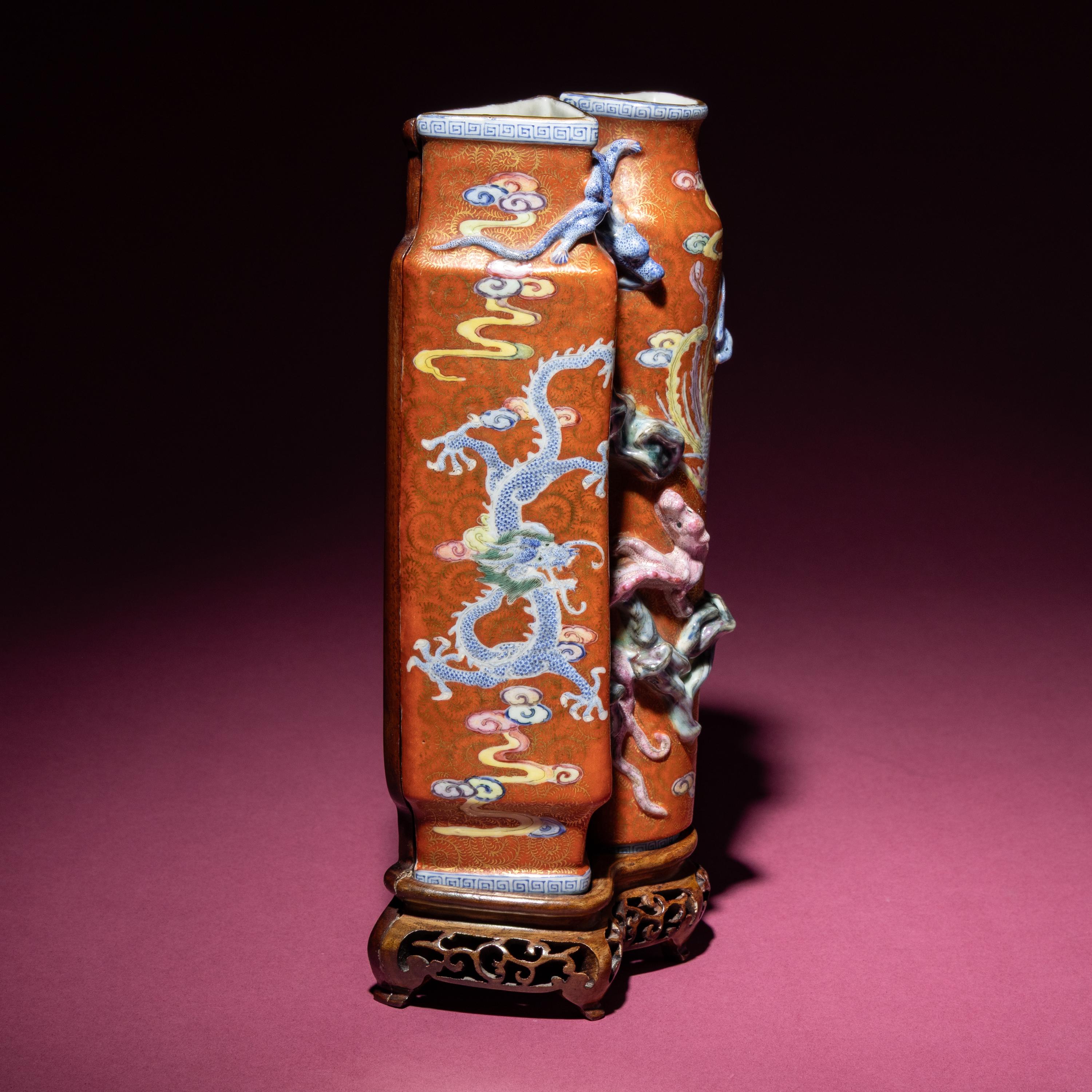 A Chinese Famille Rose 'Dragon and Phoenix' Gilt on Coral Ground Double Wall Vase, Biping , 19th Century — 清晚期 珊瑚紅地粉彩凸塑龍紋雙聯瓶