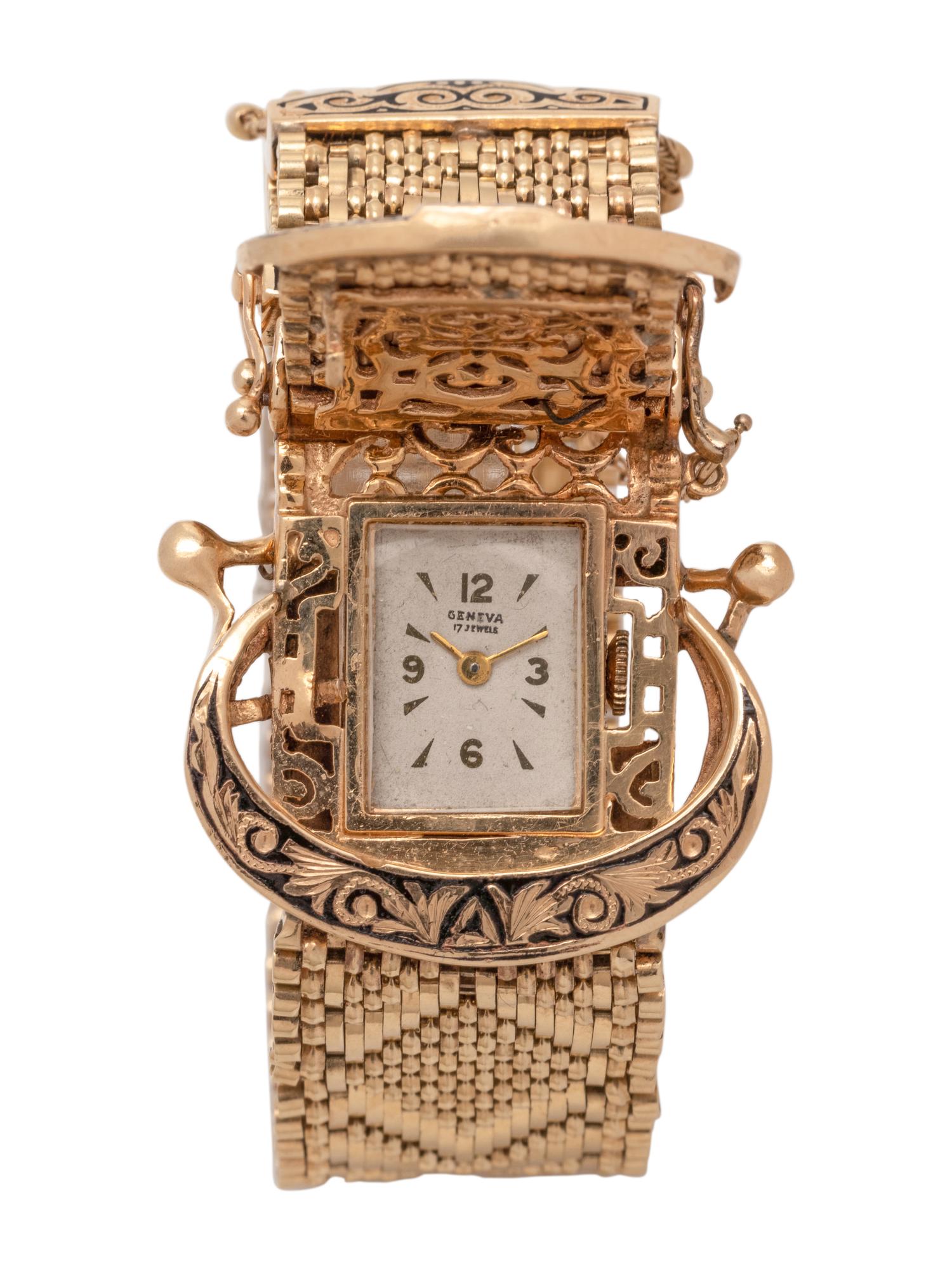 YELLOW GOLD AND ENAMEL BELT MOTIF SURPRISE WRISTWATCH