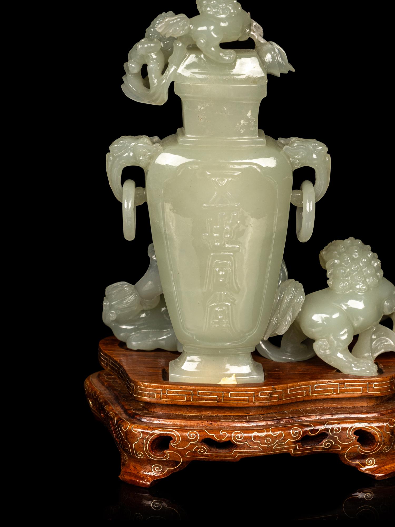 A Chinese Pale Celadon Jade Vase and Cover