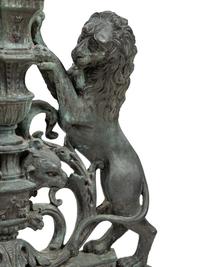 A Pair of Continental Cast Metal Andirons