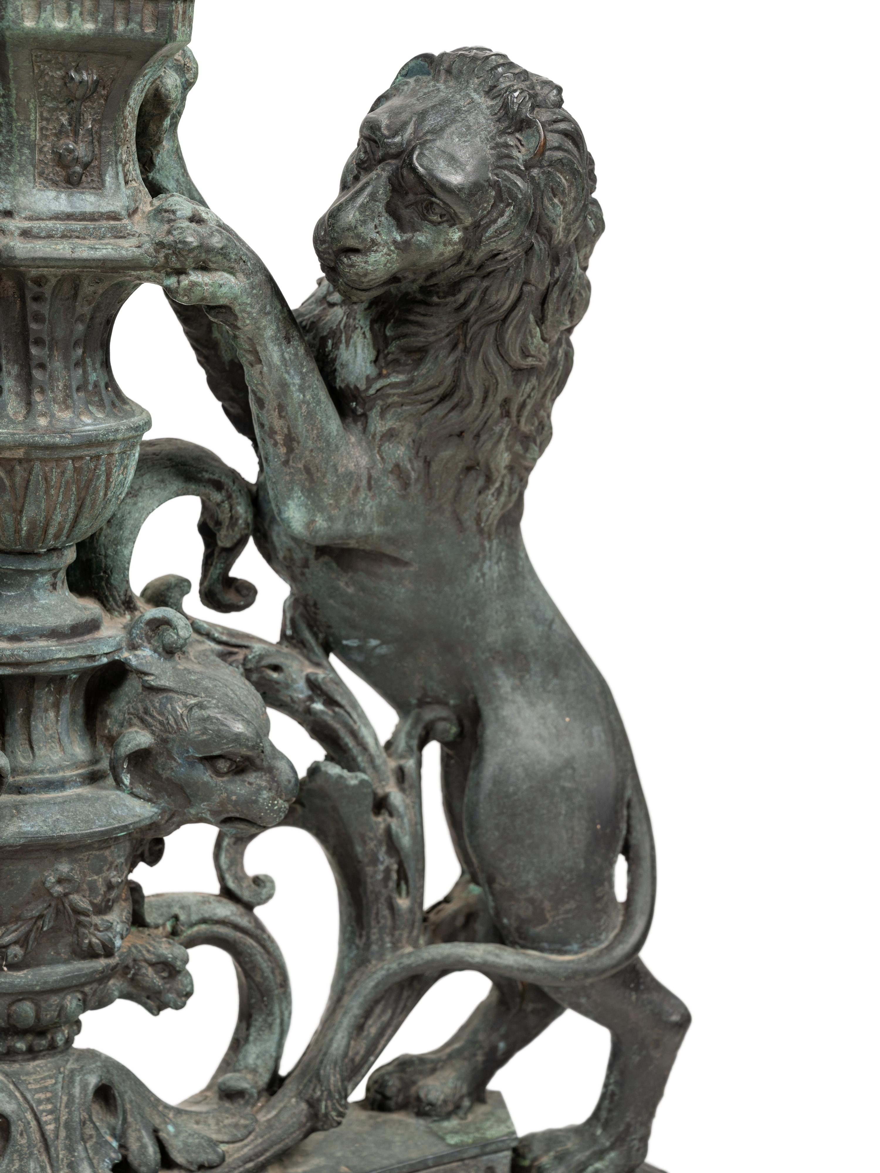 A Pair of Continental Cast Metal Andirons
