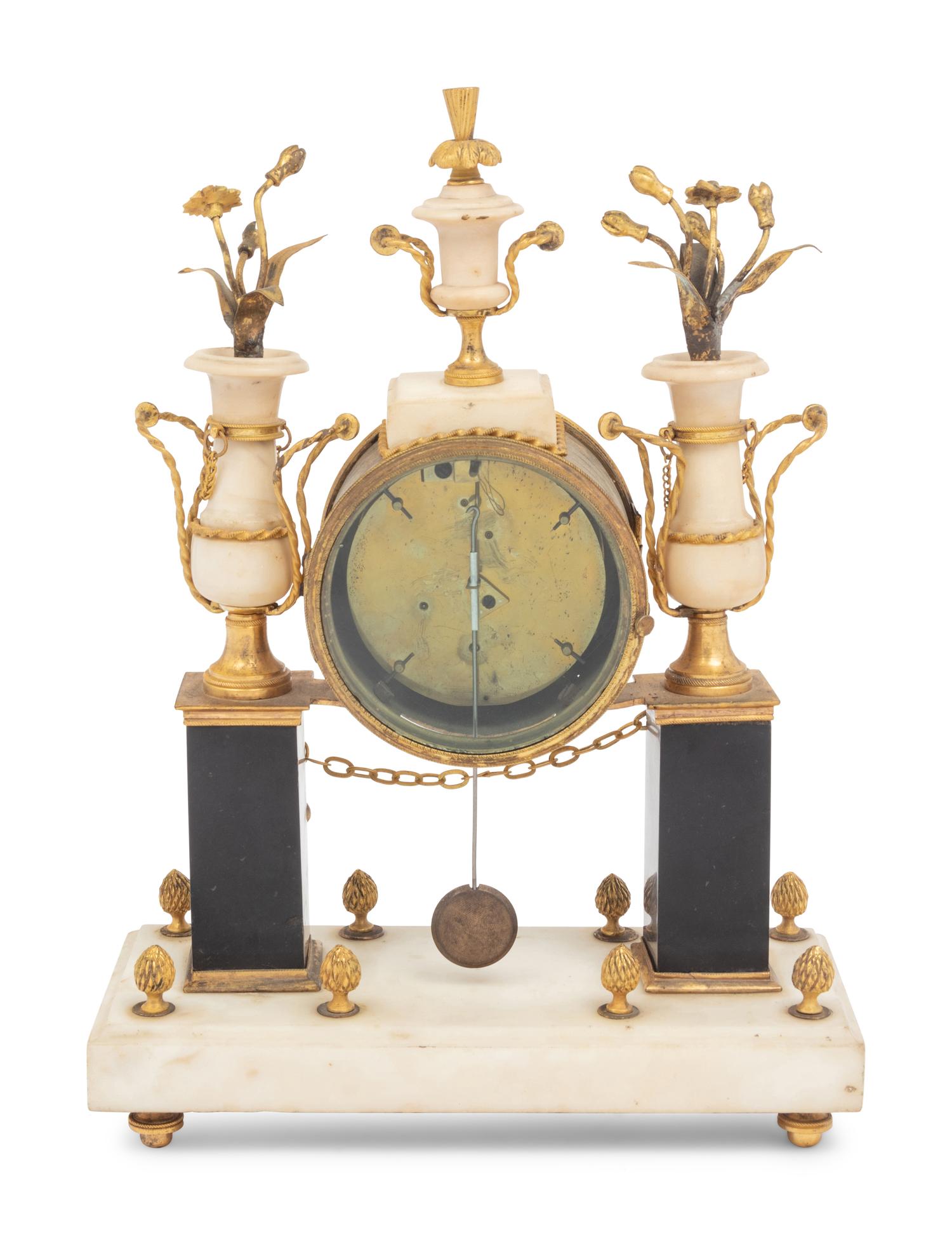 A Directoire Gilt Bronze and Marble Mantel Clock
