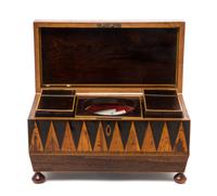 An English Parquetry Tea Caddy Height 7 x width 12 inches. — 19TH CENTURY