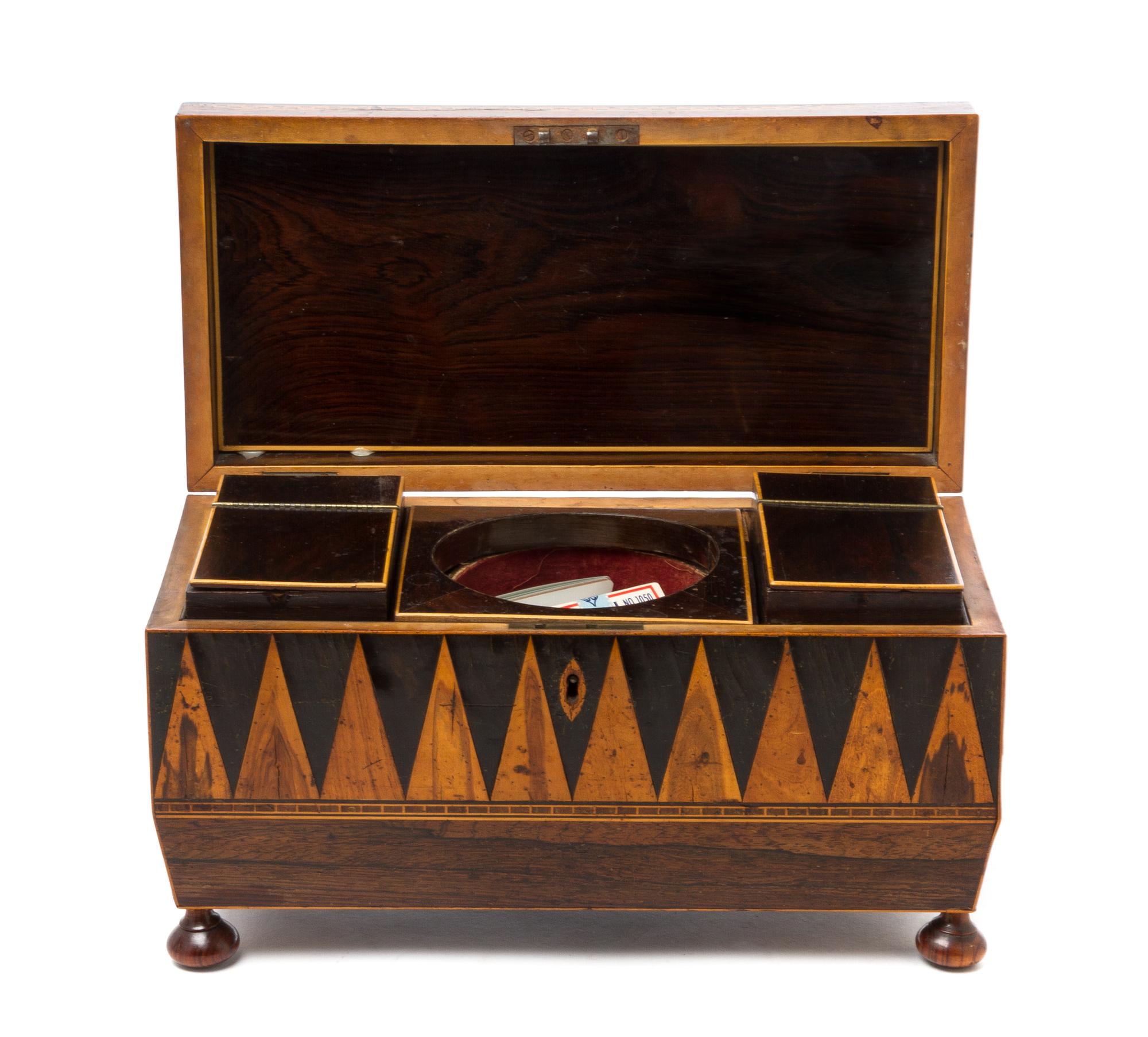 An English Parquetry Tea Caddy Height 7 x width 12 inches. — 19TH CENTURY
