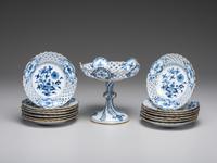 Fourteen Meissen ' Blue Onion' Reticulated Porcelain Plates