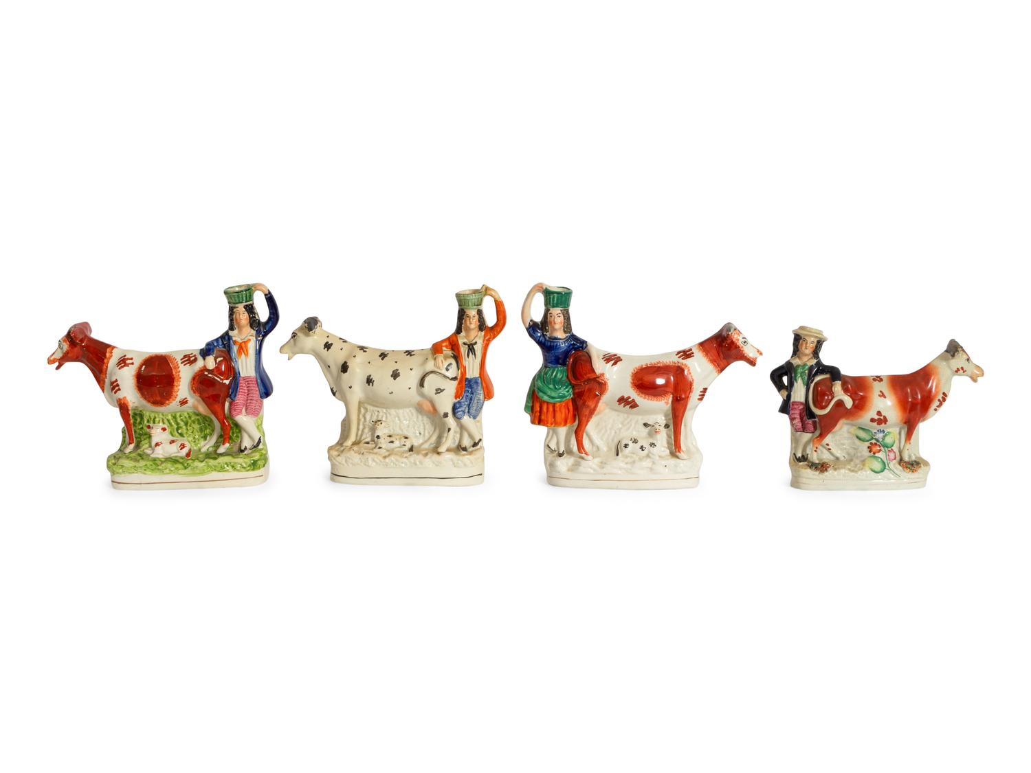 A Collection of Twelve Staffordshire Pottery Figures and Figural Wares