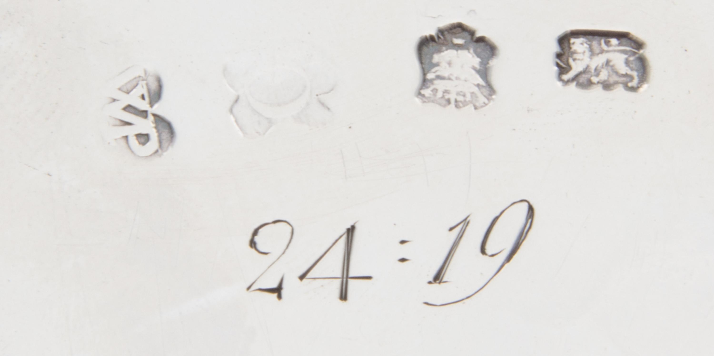 A George II Silver Salver, William Peaston, London, 1749, having a shell border and chased with foliate design surrounding a vacant car
