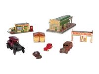 A Group of Toy Service Stations and Cars