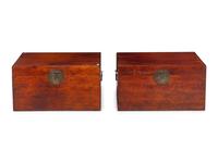 A Pair of Chinese Leather Upholstered Chests
