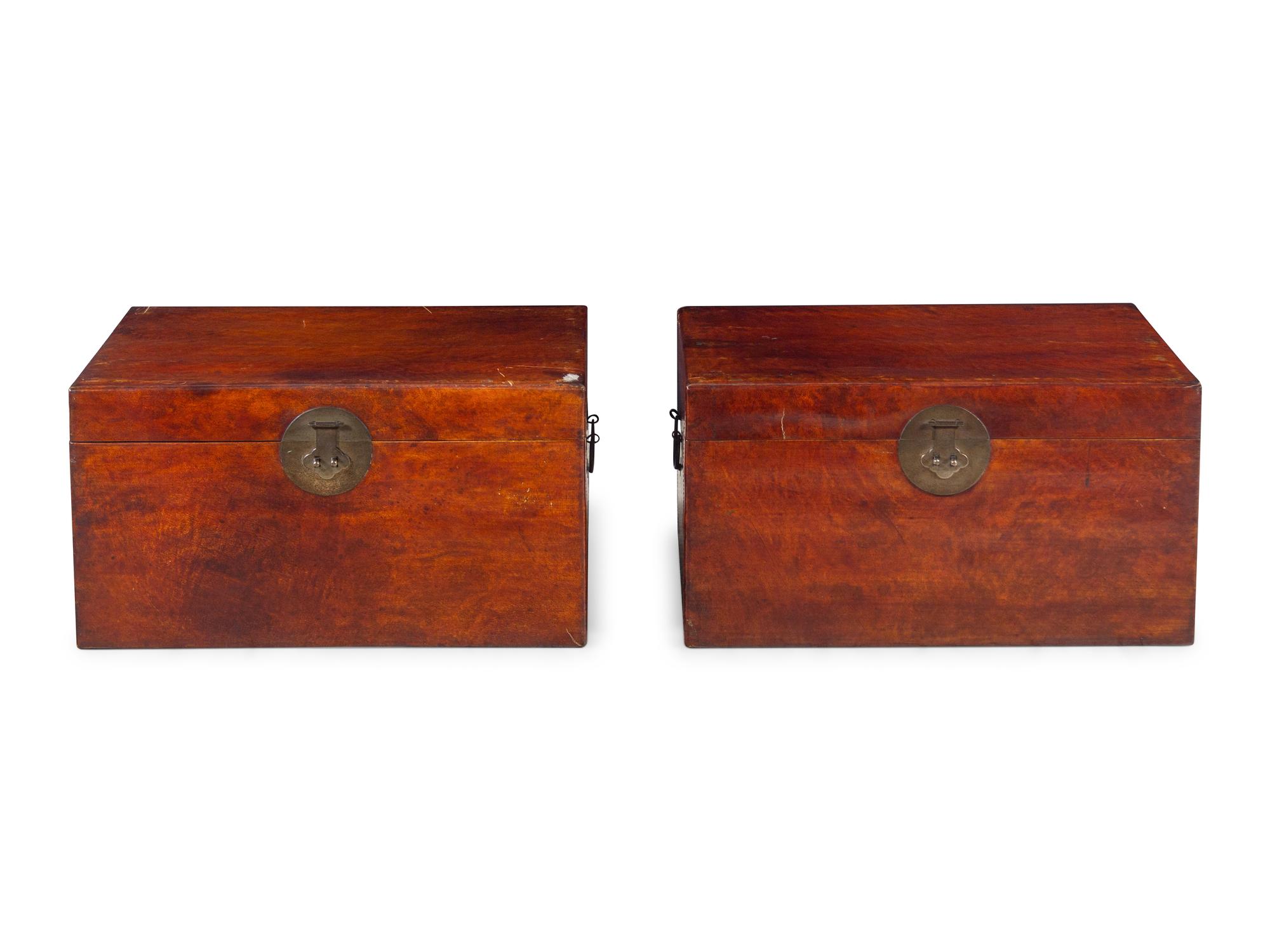 A Pair of Chinese Leather Upholstered Chests