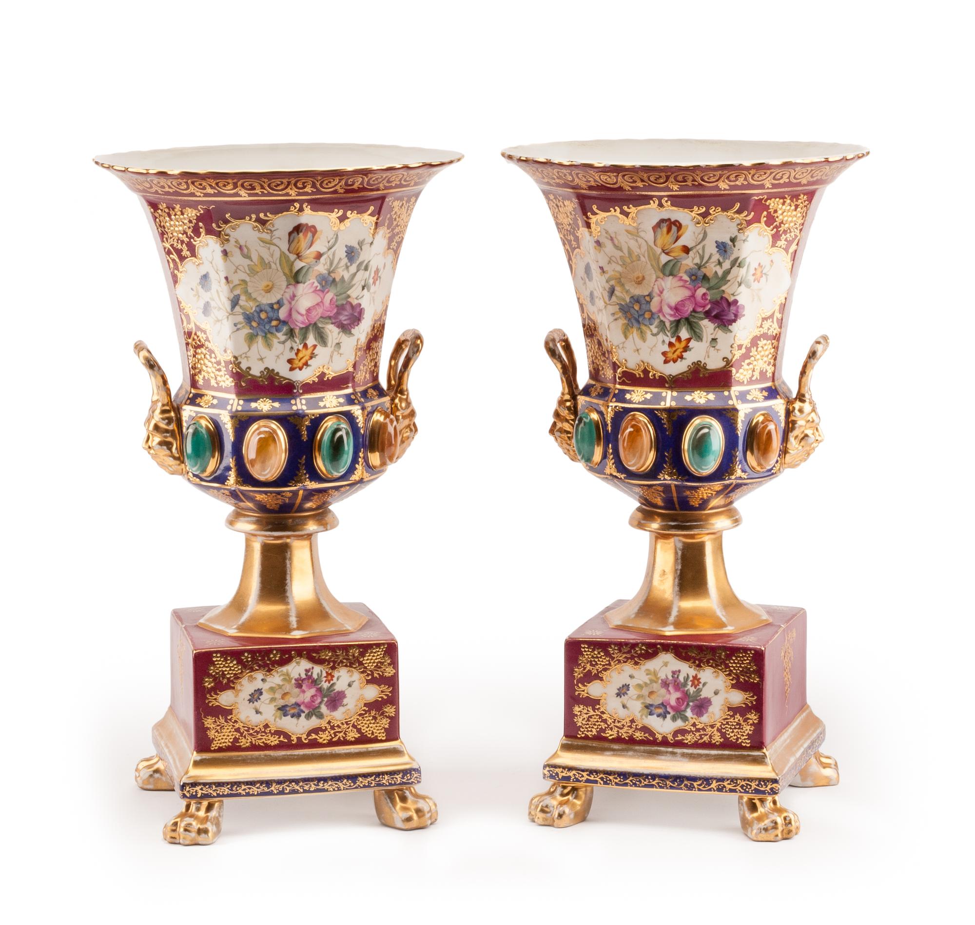 A Pair of Sevres Style Porcelain Urns Height 18 inches.