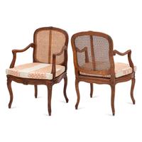 A Pair of Louis XV Style Cane Upholstered Fauteuils