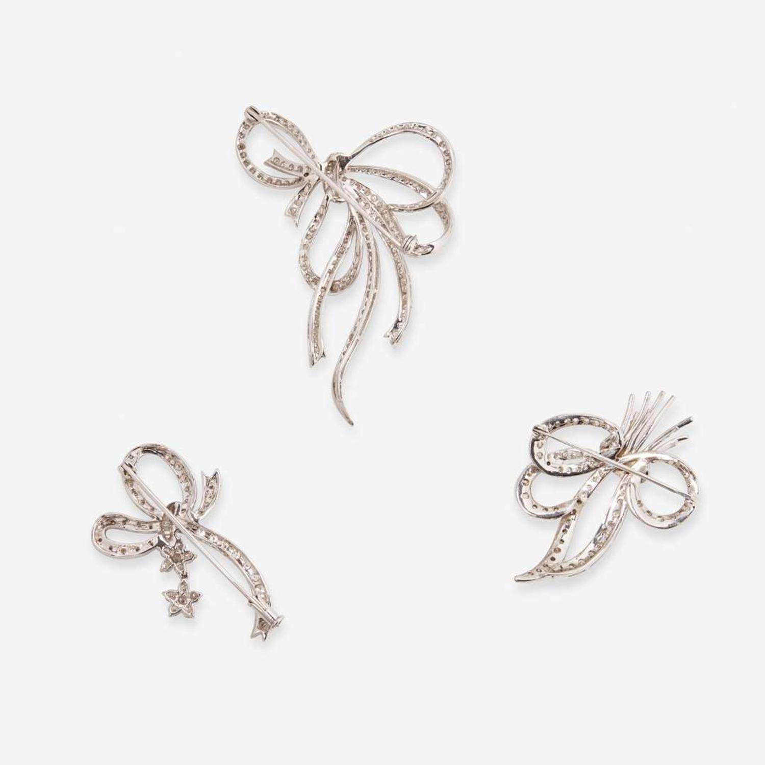 A Collection of White Gold and Diamond Pins