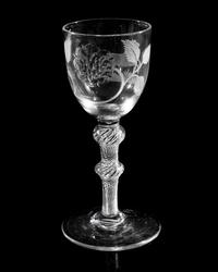 A Hanoverian Engraved Air Twist Wine Glass