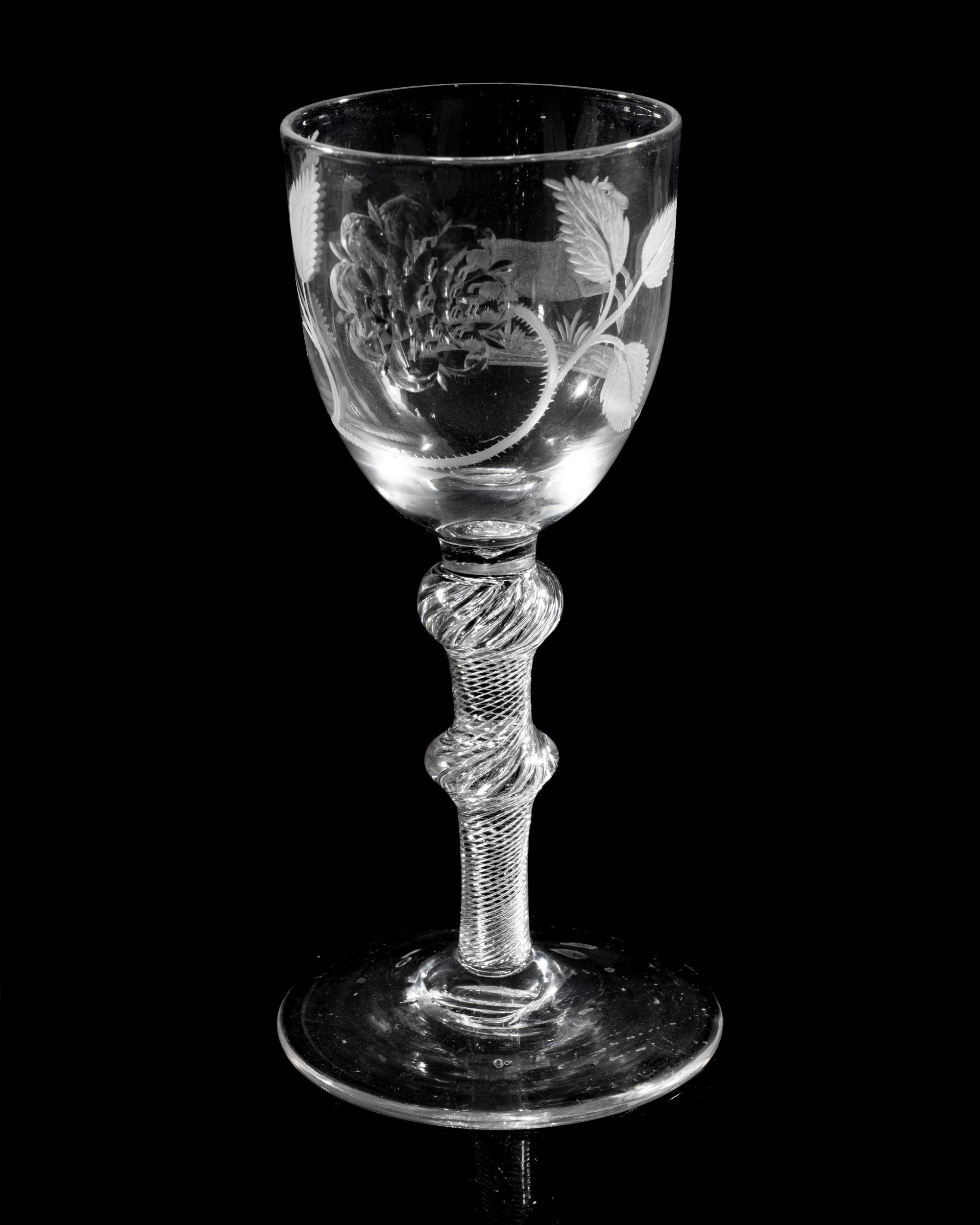 A Hanoverian Engraved Air Twist Wine Glass