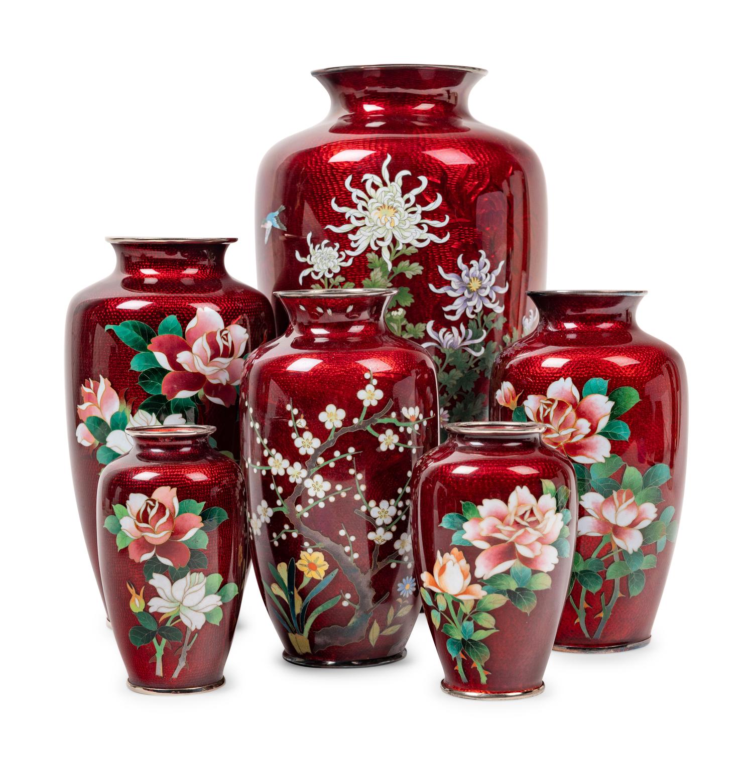 12 Japanese Red Ground Cloisonné Enamel and Embossed Foil 'Ginbari' Articles