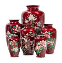 12 Japanese Red Ground Cloisonné Enamel and Embossed Foil 'Ginbari' Articles