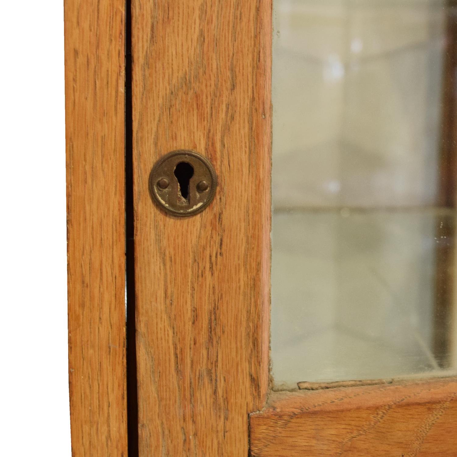 An Oak Showcase 22.5" W x 33" D x 53.5" H — United States, 19th/20th Century