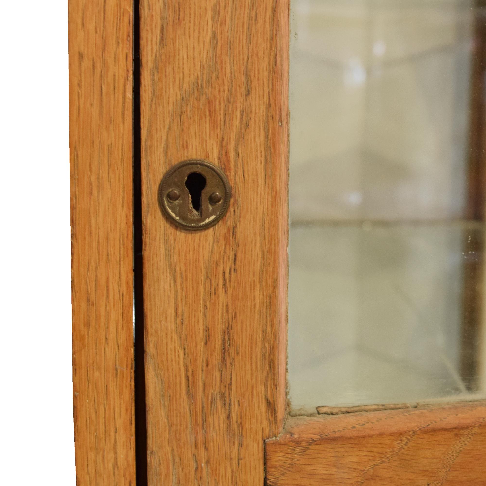 An Oak Showcase 22.5" W x 33" D x 53.5" H — United States, 19th/20th Century
