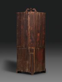 A Late Chippendale Carved Cherrywood Corner Cupboard