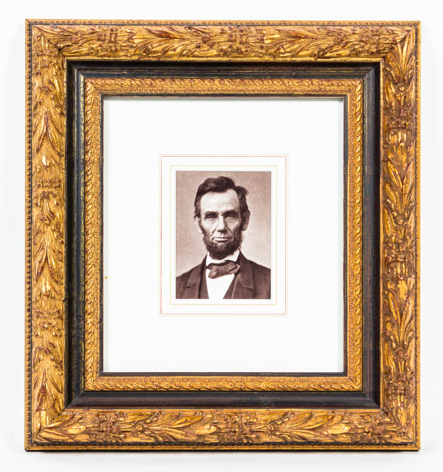 A Shoulder Length Portrait of Abraham Lincoln 14 1/2 x 13 1/2 inches (framed).