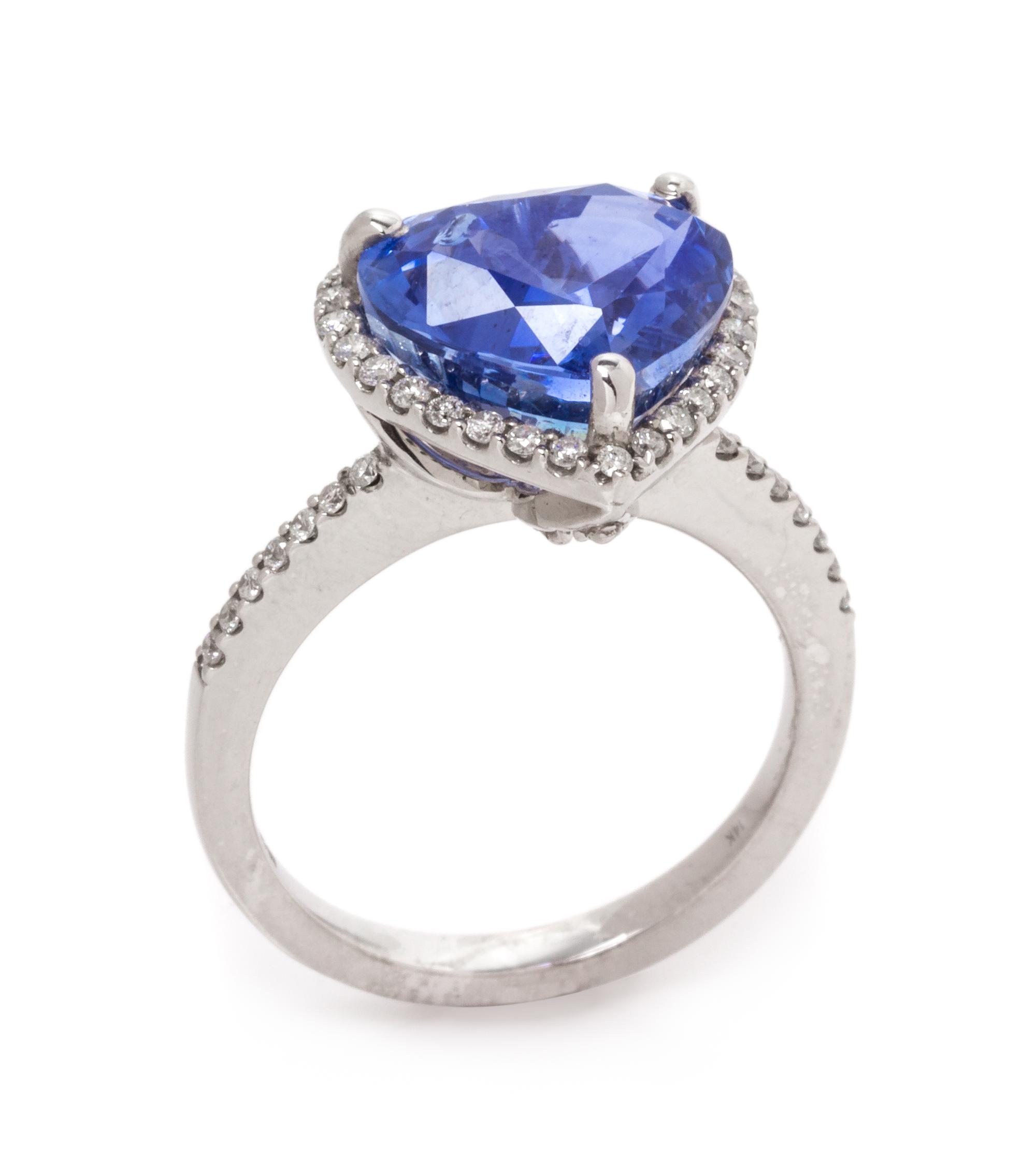 A 14 Karat White Gold, Sapphire and Diamond Ring, 3.50 dwts.