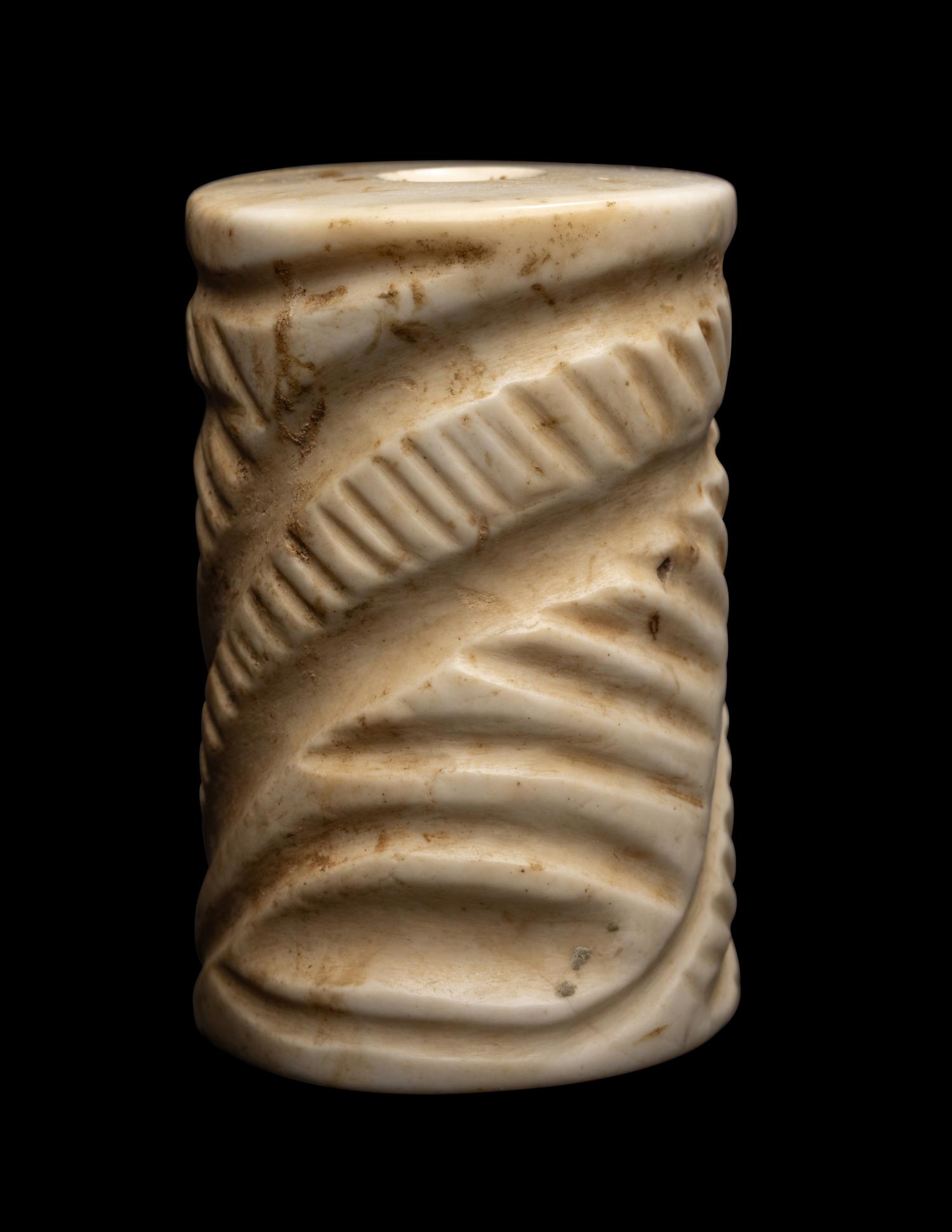 A Mesopotamian Limestone Cylinder Seal