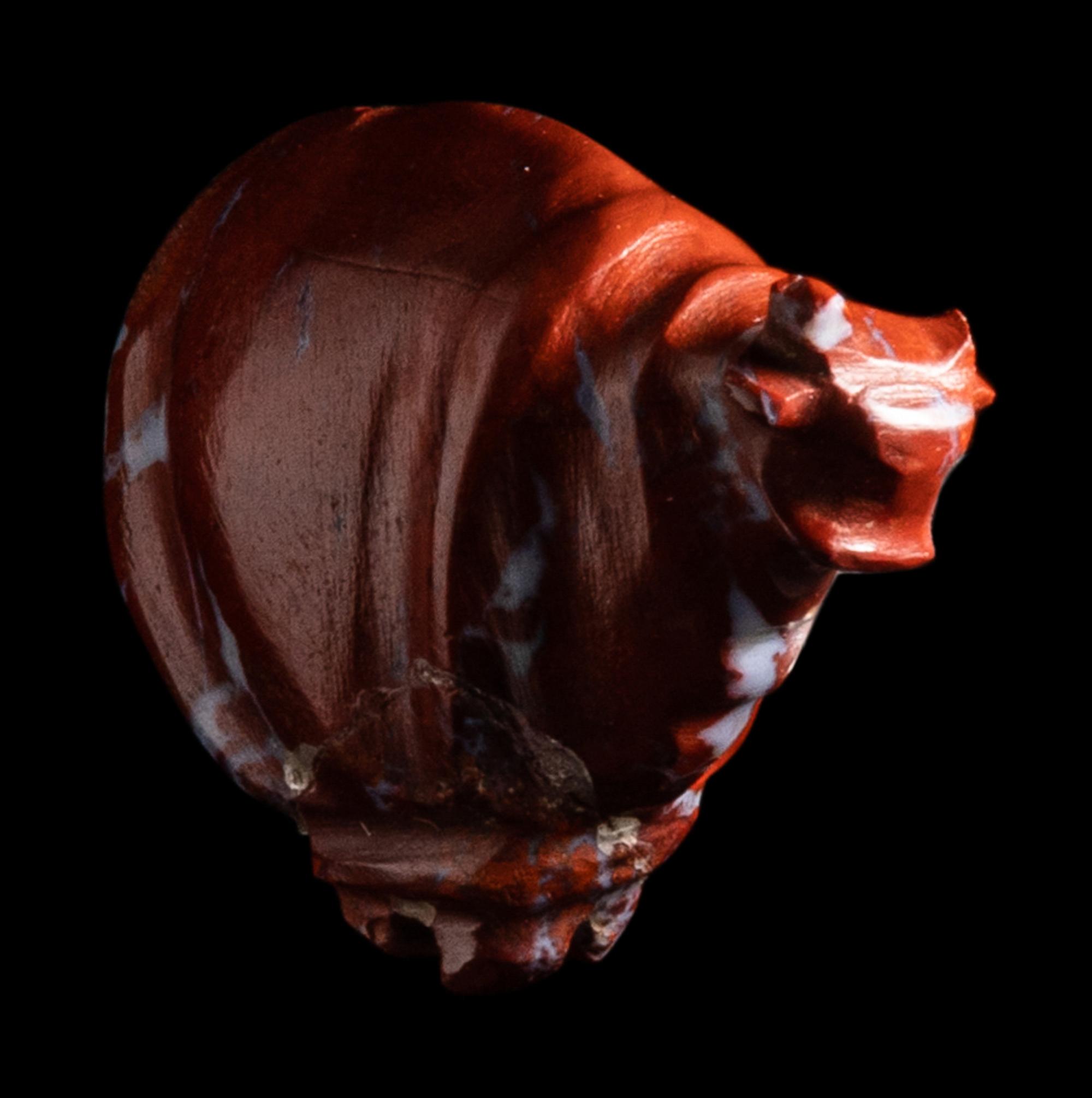 An Egyptian Red Jasper Trussed Ox
