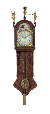 A Dutch Carved Oak Bracket Clock, Height 60 inches.