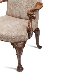 A Pair of George III Style Carved Walnut Library Armchairs