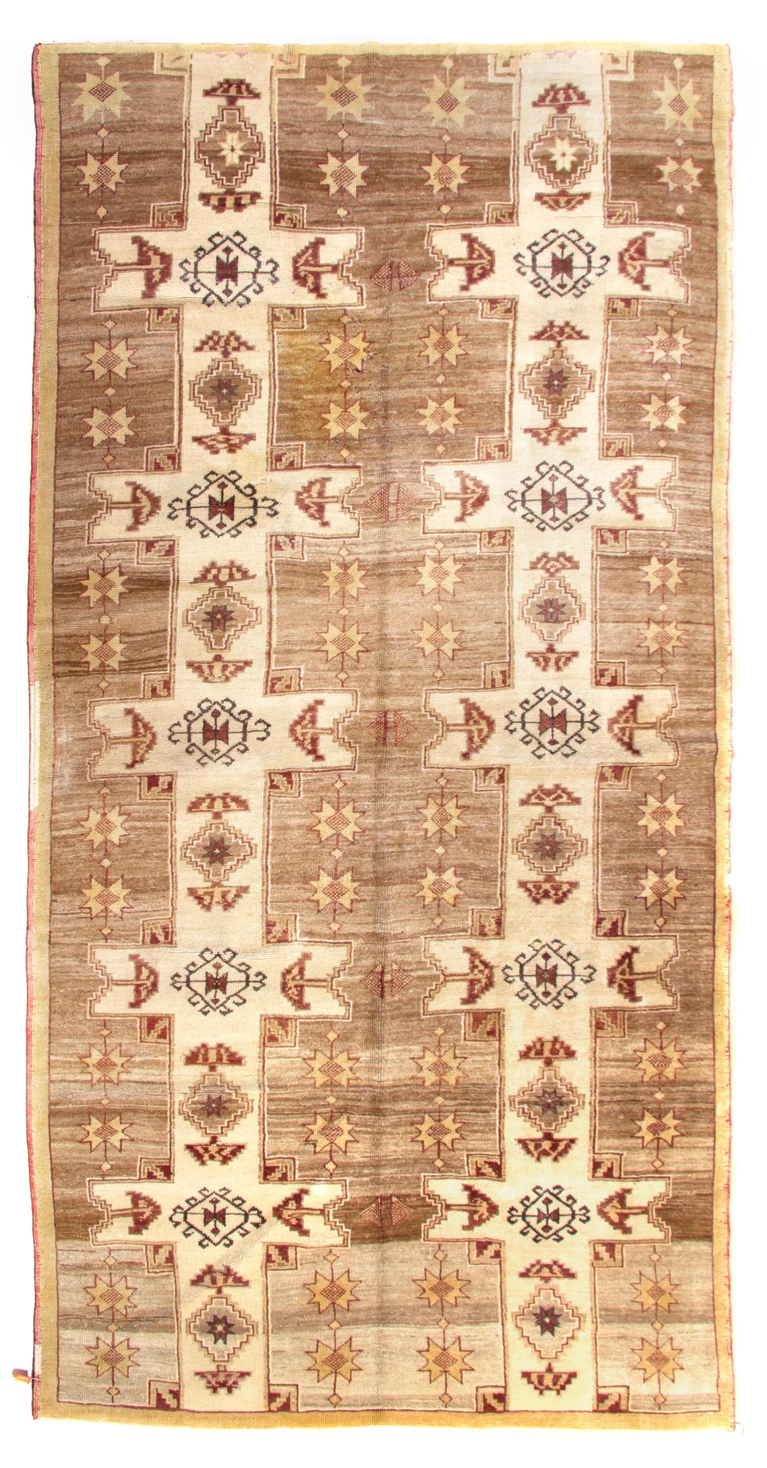 An Oushak Wool Rug, 10 feet 5 inches x 5 feet 6 inches.