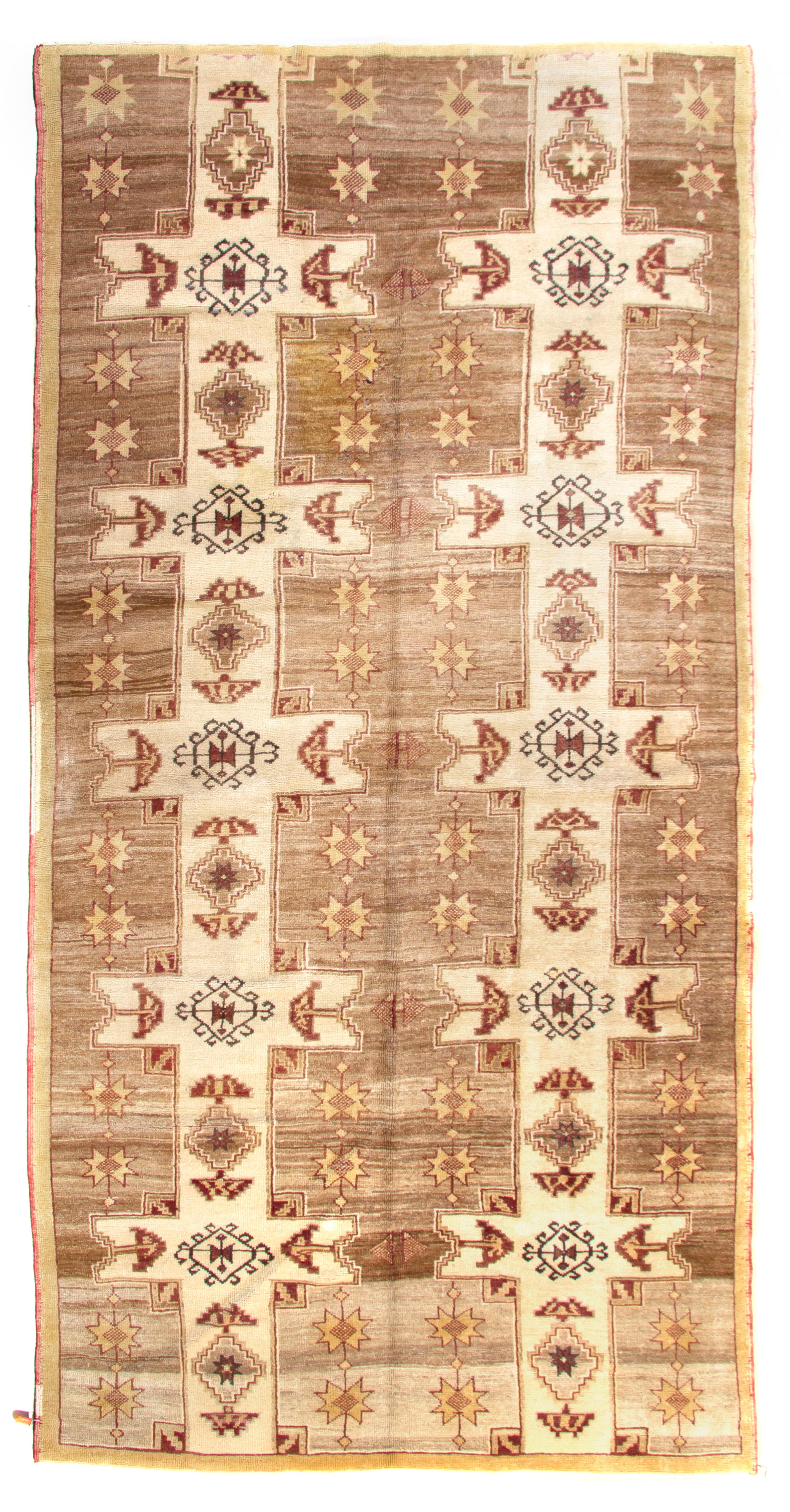 An Oushak Wool Rug, 10 feet 5 inches x 5 feet 6 inches.