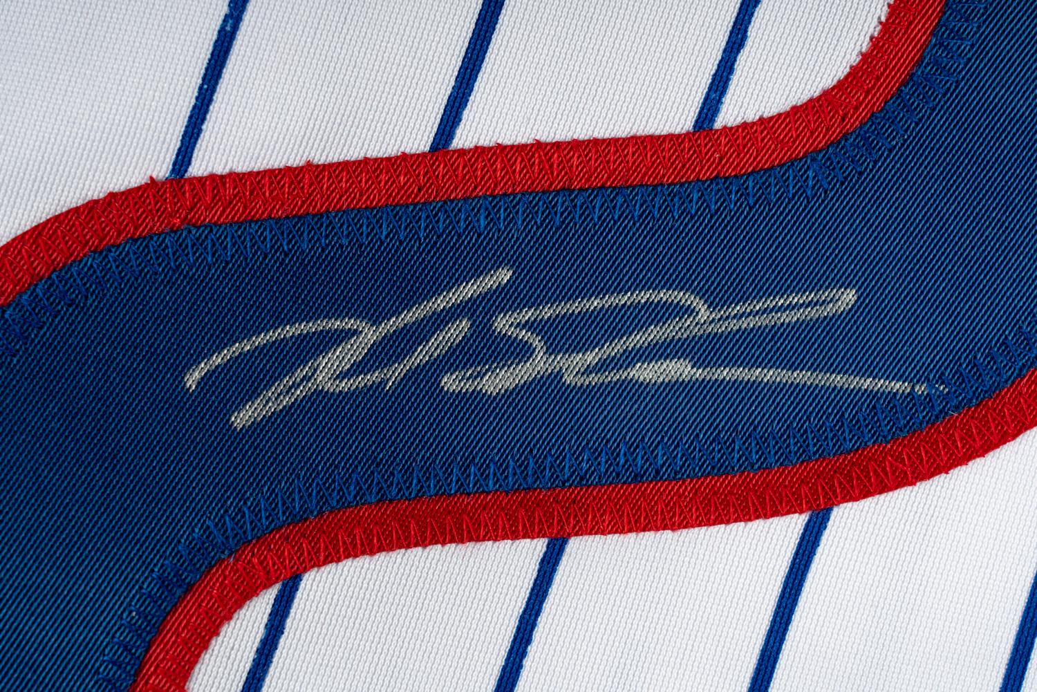 A Large Group of Chicago Cubs Memorabilia Featuring a Signed Kyle Schwarber Jersey