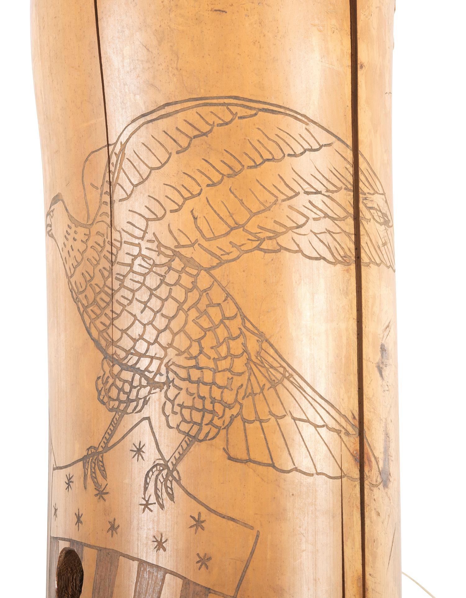[SPANISH AMERICAN WAR]. Spanish American War-period bamboo canteen with folk art decoration. Ca late 19th century.