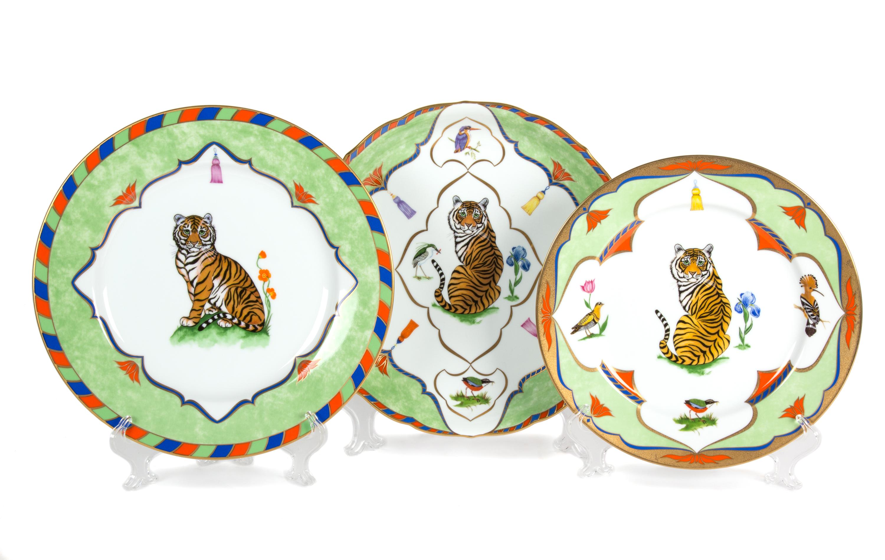 A Lynn Chase Porcelain Dinner Service Diameter of largest 12 inches.