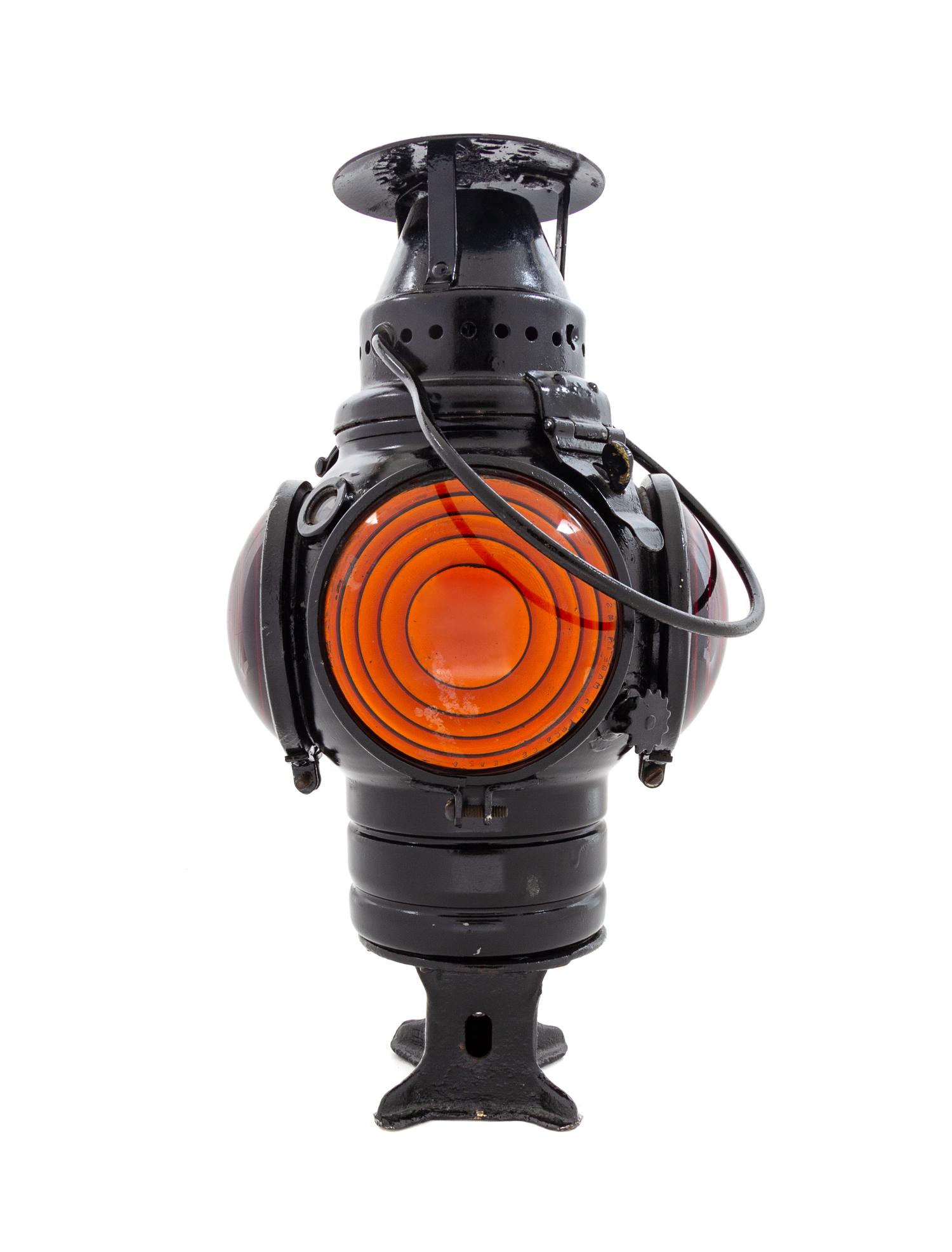 An Adlake Painted Metal Four-Light Railroad Lantern