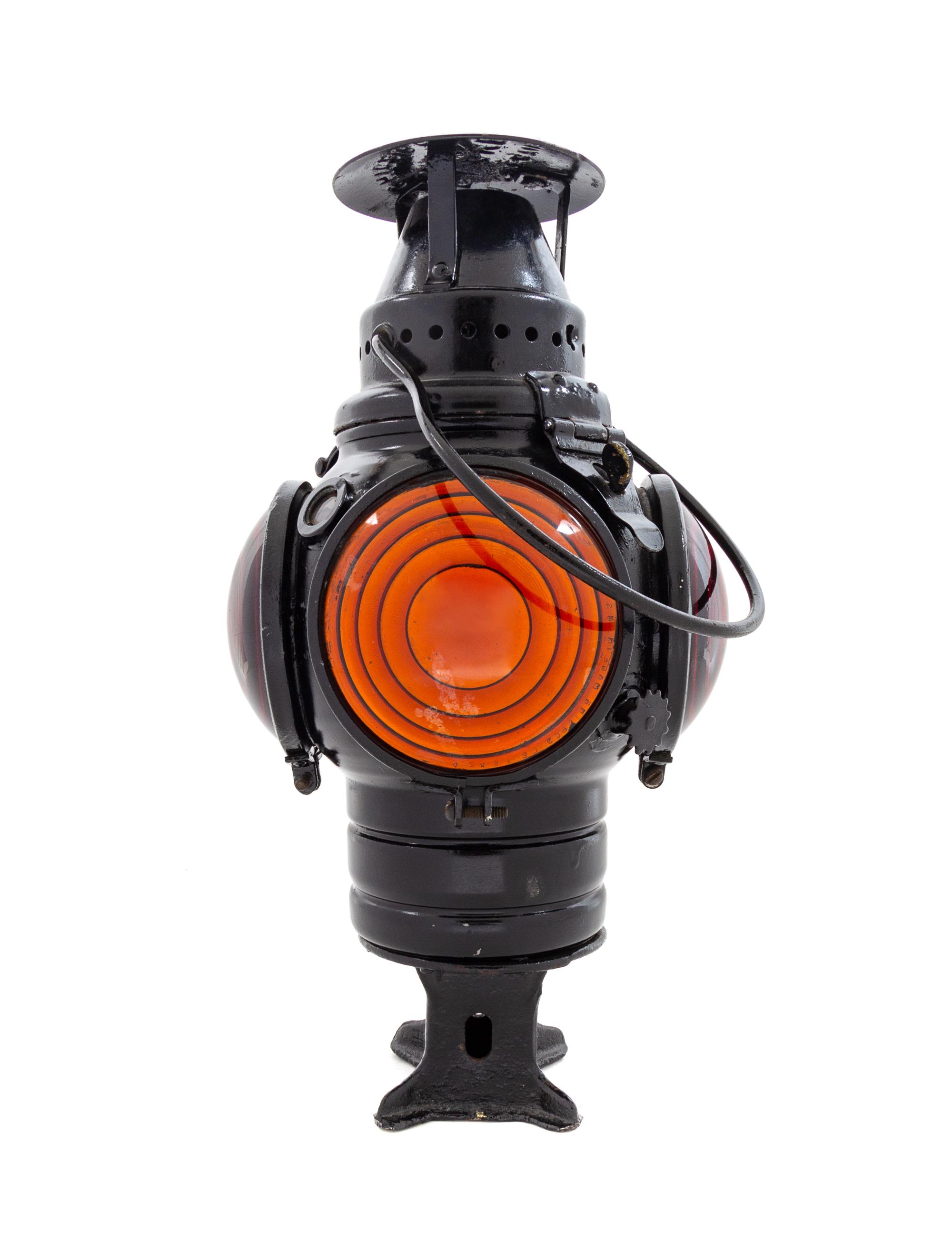 An Adlake Painted Metal Four-Light Railroad Lantern