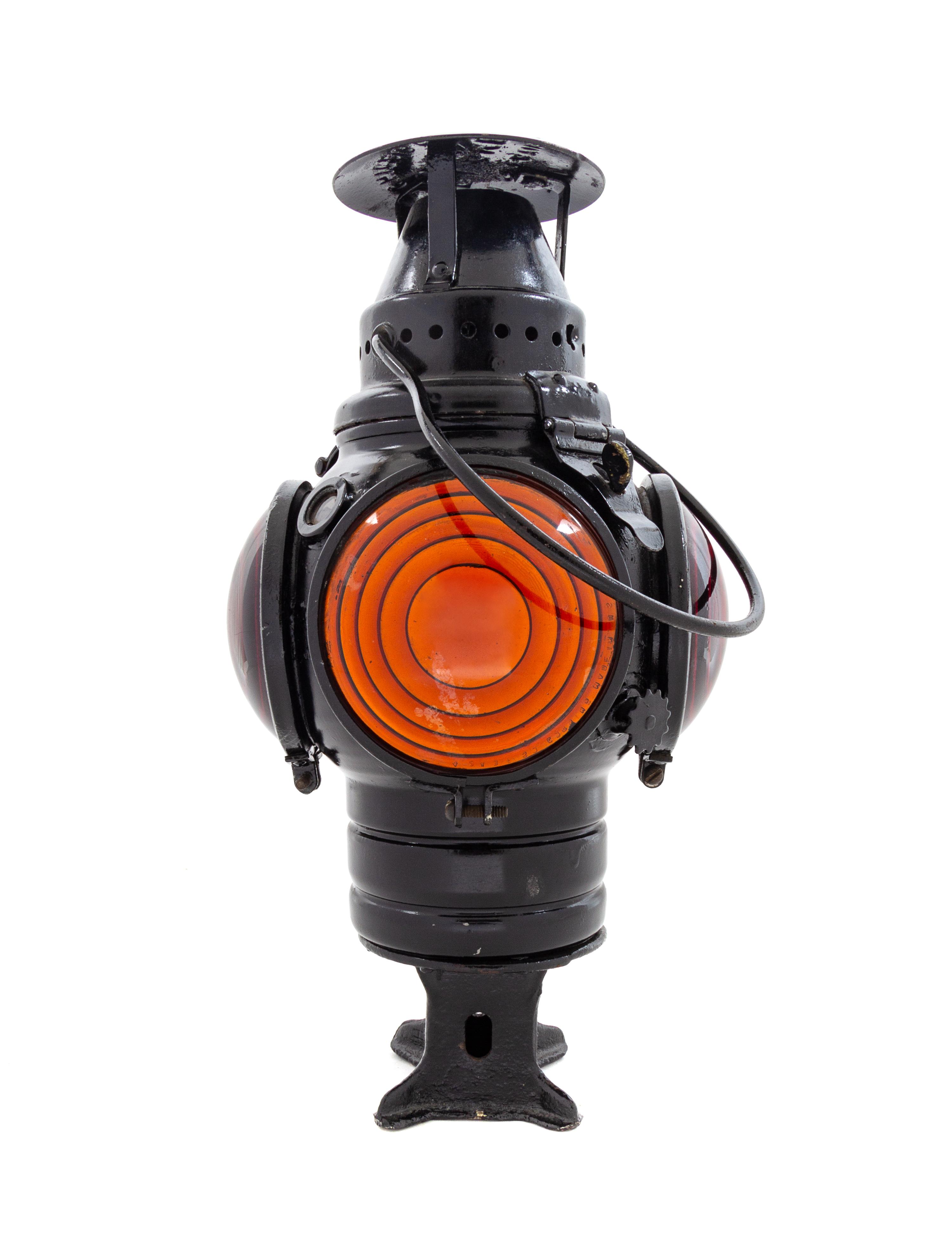 An Adlake Painted Metal Four-Light Railroad Lantern
