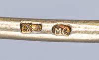A Russian Silver-Gilt and Enamel Spoon, Mark of Maria Semenova, Moscow, early 20th century, having a green enameled spherical finial, t